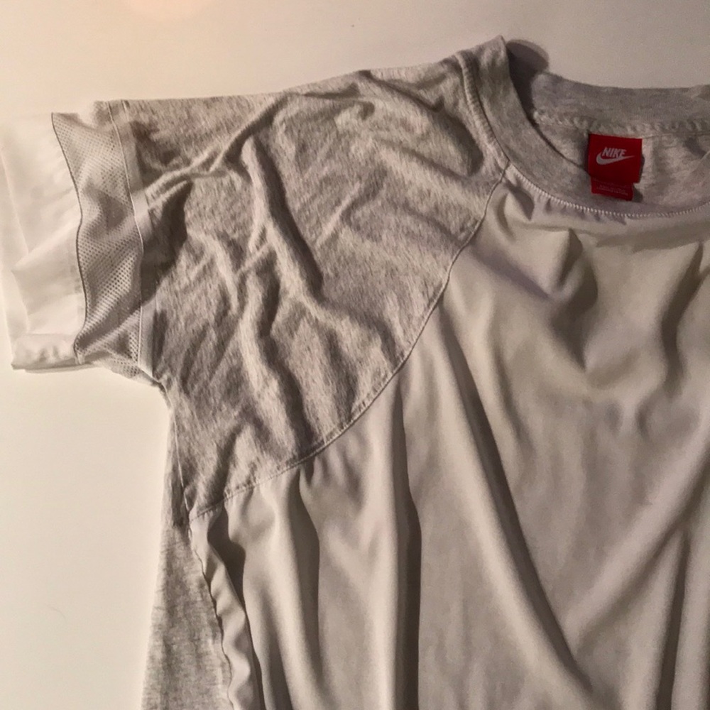 Nike sportswear. Fits more like a medium-large
